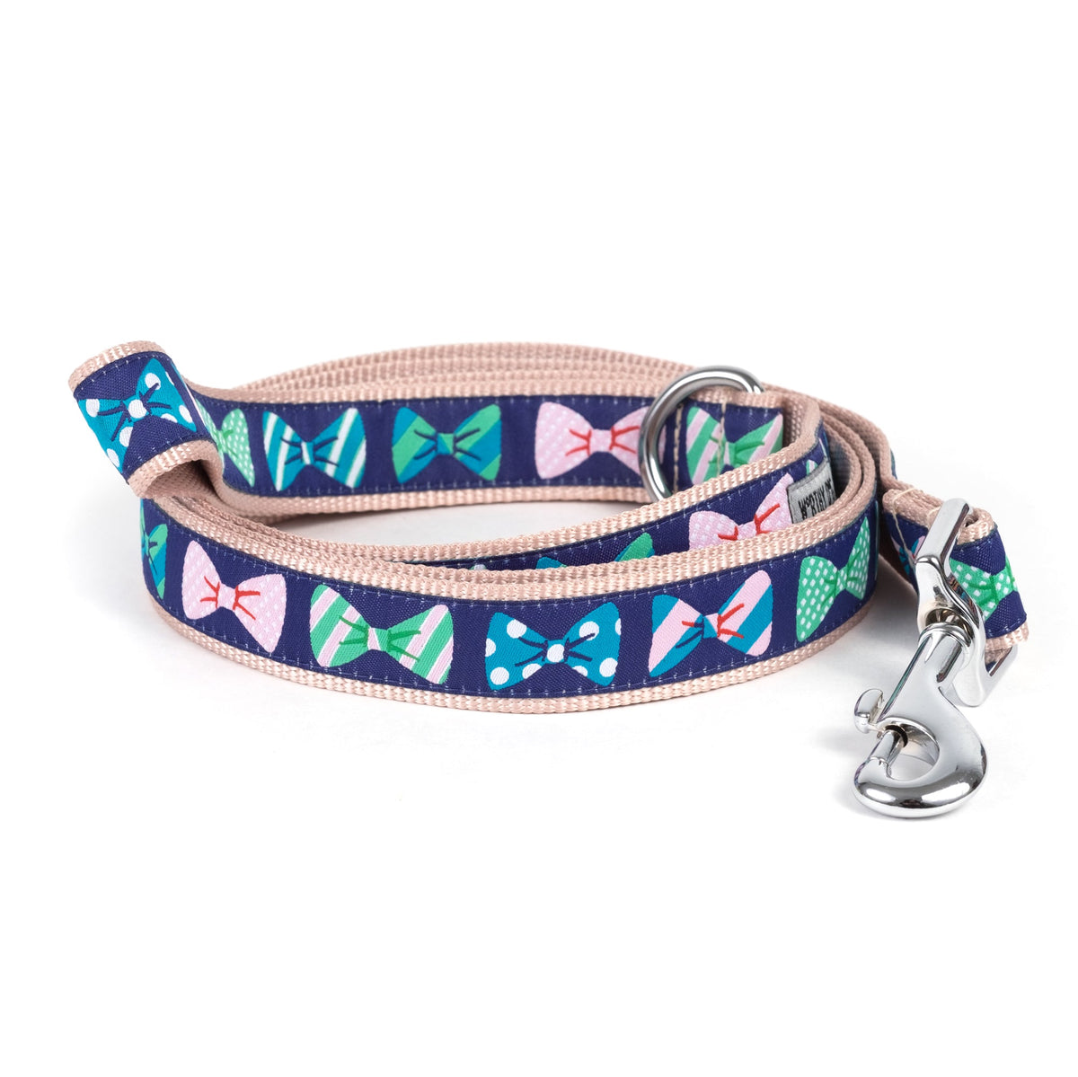 Navy blue bow tie pattern nylon dog leash coiled