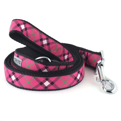 Pink plaid nylon dog leash coiled