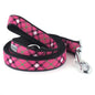Pink plaid nylon dog leash coiled