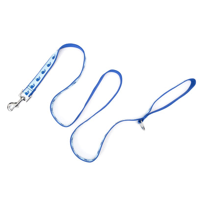 Dark blue whales with water spouts on light blue ribbon nylon dog leash, extended