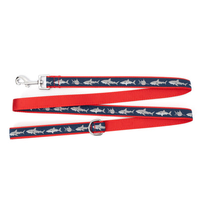 Light-colored shark silhouettes on navy ribbon nylon dog leash, ribbon and red backing detail