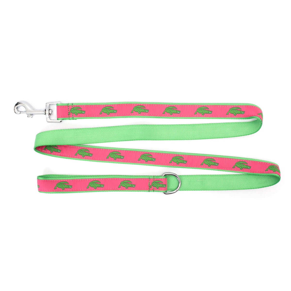 Pink alligator dog leash showing green nylon backing and accessory D-ring