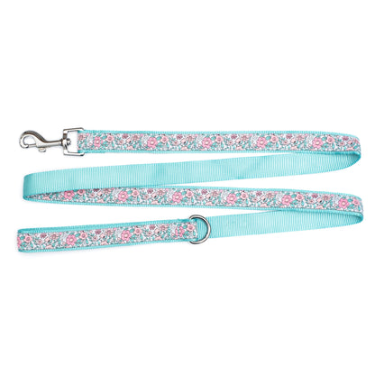 Pink flowers with green foliage on pale ribbon nylon dog leash, ribbon and backing detail