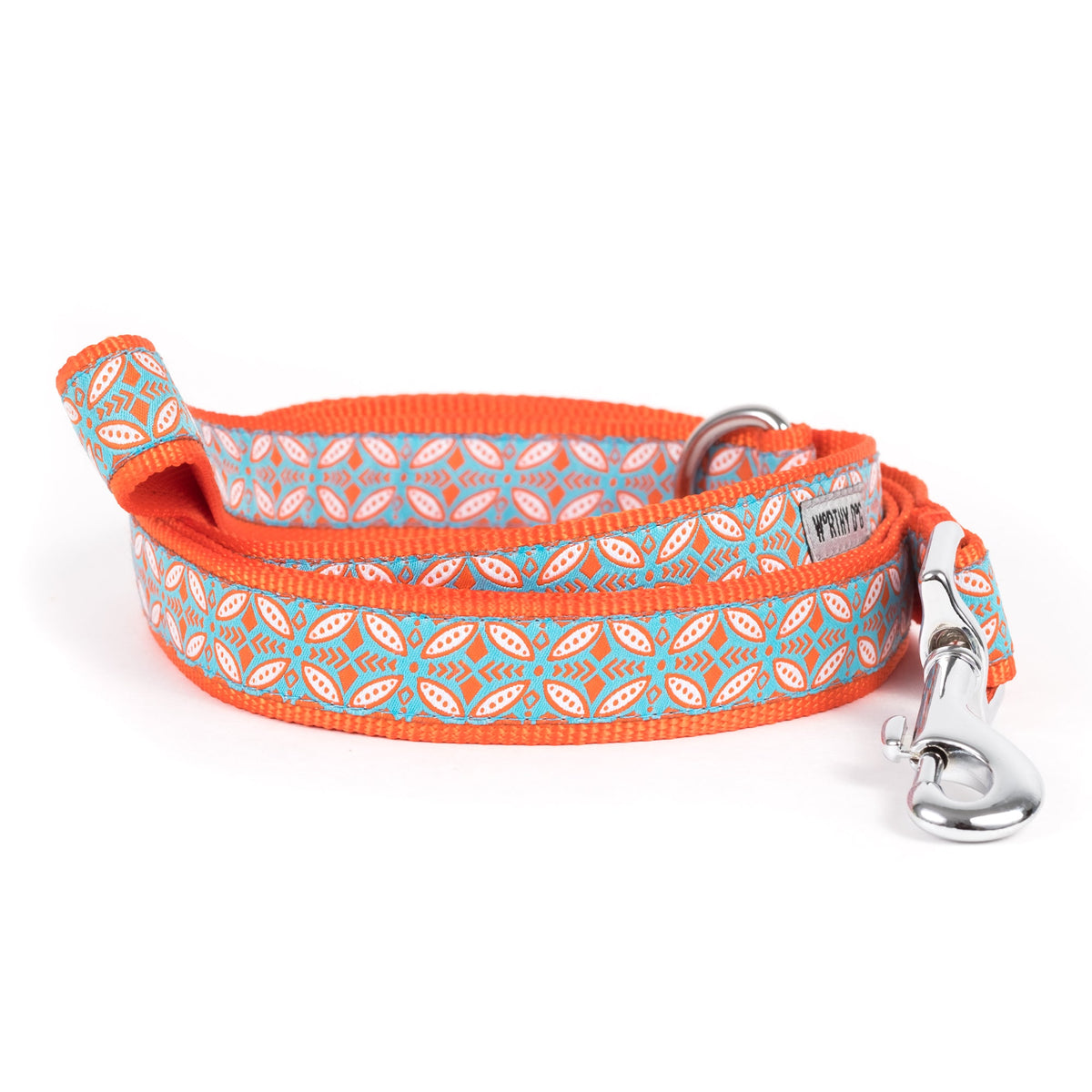 Repeating decorative stamp-style motifs nylon dog leash, coiled
