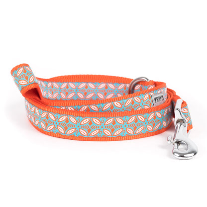 Repeating decorative stamp-style motifs nylon dog leash, coiled