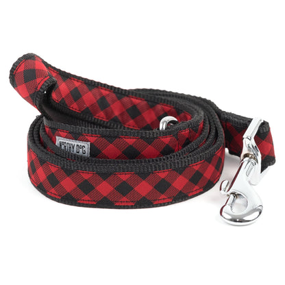Red and black buffalo plaid nylon leash coiled
