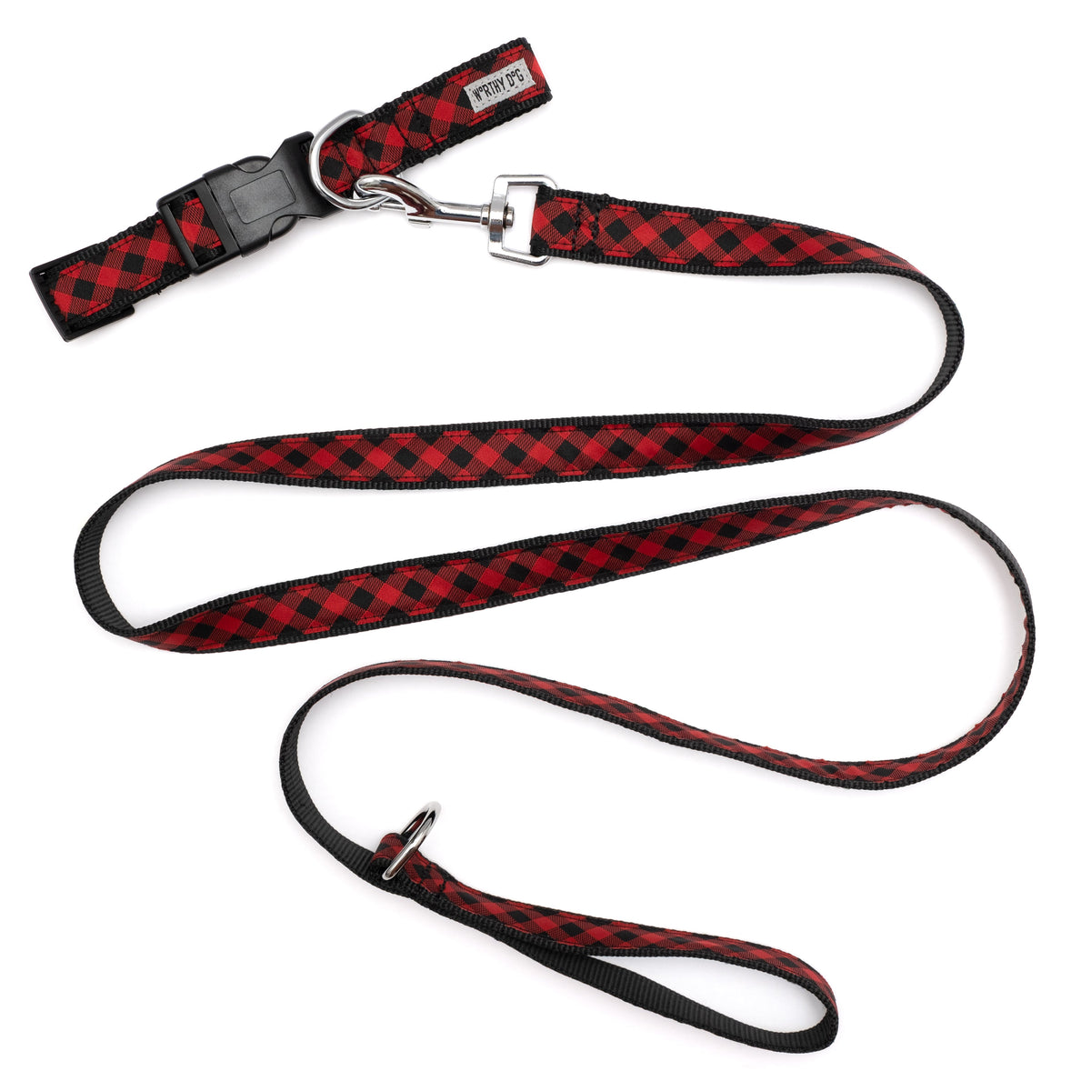Red buffalo plaid leash displayed with matching collar; collar not included