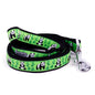 Pandas and bamboo illustrations on green ribbon nylon dog leash, coiled