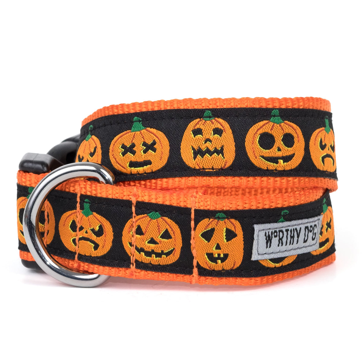 Orange jack-o-lantern faces on black ribbon Halloween dog collar, front view