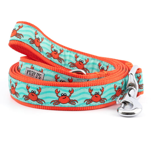 Red crabs on a teal patterned background nylon dog leash, coiled