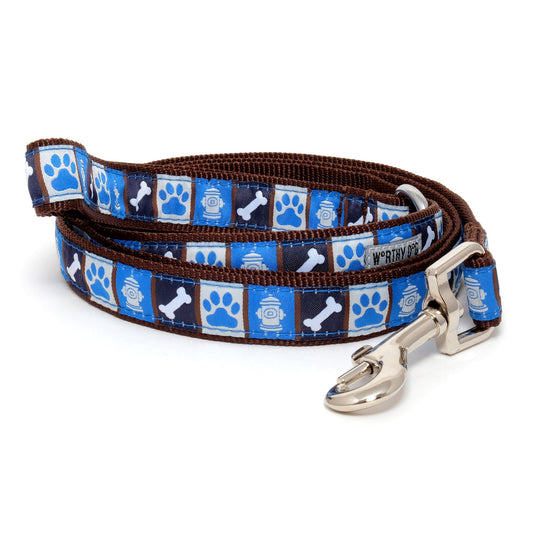 Blue paw and bone nylon dog leash coiled