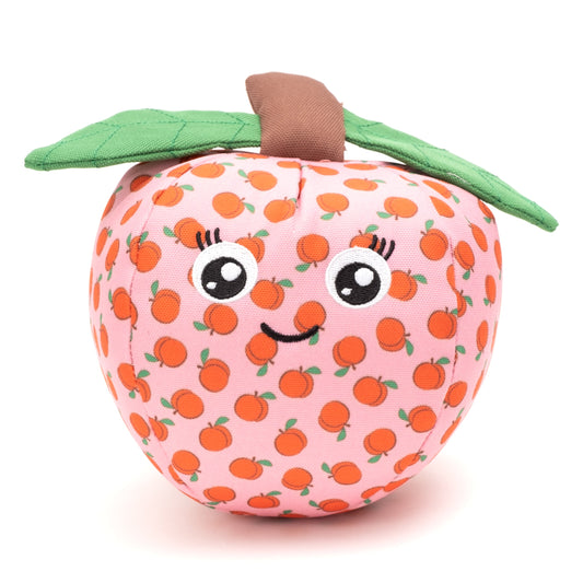 Peach Squeaky Dog Toy with Green Leaf, front view with smiling face