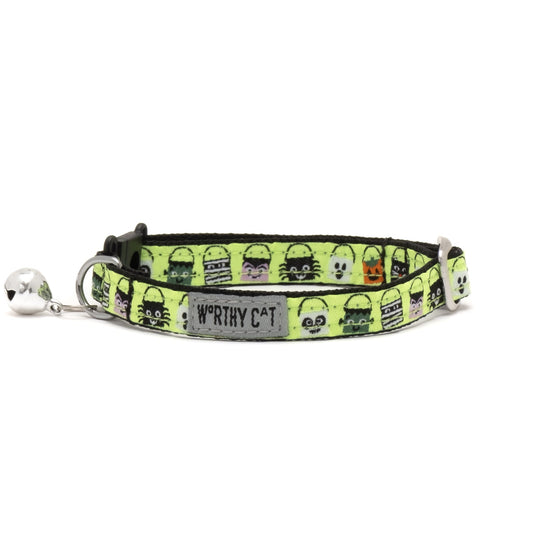 Halloween candy-bucket characters on lime ribbon Halloween cat collar, front view with bell