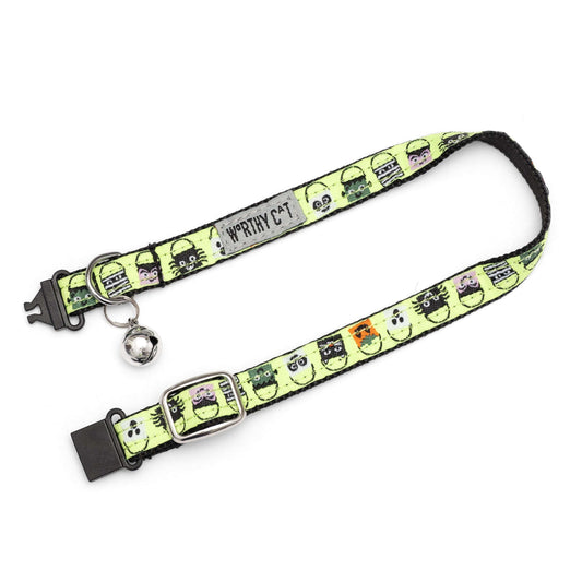 Halloween candy-bucket characters on lime ribbon Halloween cat collar, extended with clasp open