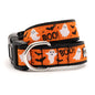 White ghosts, black bats and BOO lettering on orange ribbon Halloween dog collar, front view