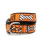 Black and white patterned bones on orange ribbon Halloween dog collar, front view