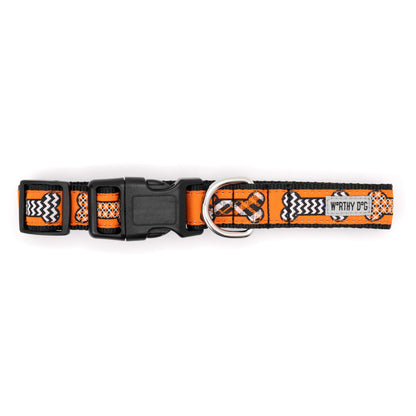 Black and white patterned bones on orange ribbon Halloween dog collar, buckle detail