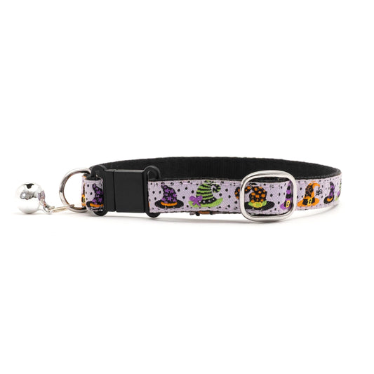 Colorful witch hats on pale purple ribbon Halloween cat collar, front view with bell