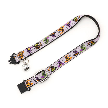 Colorful witch hats on pale purple ribbon Halloween cat collar, extended with clasp open