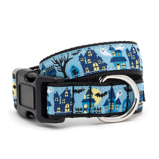 Haunted houses and ghostly figures on blue ribbon Halloween dog collar, front view