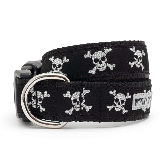 White skull and crossbones motifs on black ribbon Halloween dog collar, front view