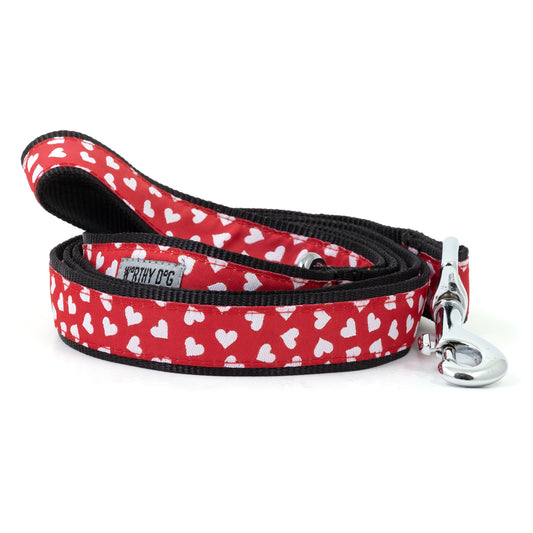 Red white-heart nylon dog leash coiled