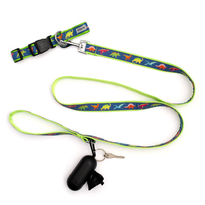 Colorful dinosaur illustrations on navy ribbon nylon dog leash, shown with matching accessories; accessories not included