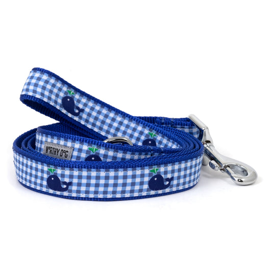Whale illustrations with blue gingham checks nylon dog leash, coiled