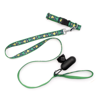 Green clover shapes on navy ribbon nylon dog leash, shown with matching accessories; accessories not included
