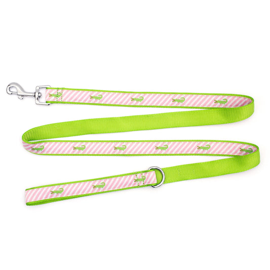 Green alligators over diagonal pink and white stripes nylon dog leash, ribbon and green backing detail