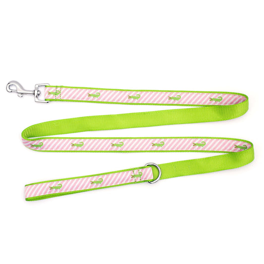 Green alligators over diagonal pink and white stripes nylon dog leash, ribbon and green backing detail