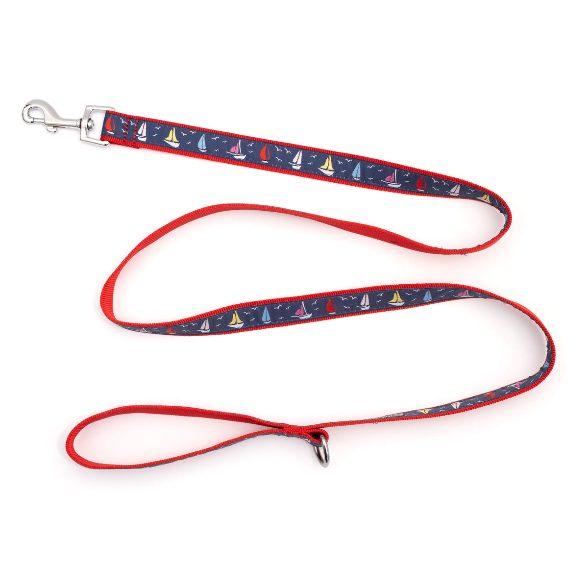 Repeating sailboat illustrations on navy ribbon nylon dog leash, extended