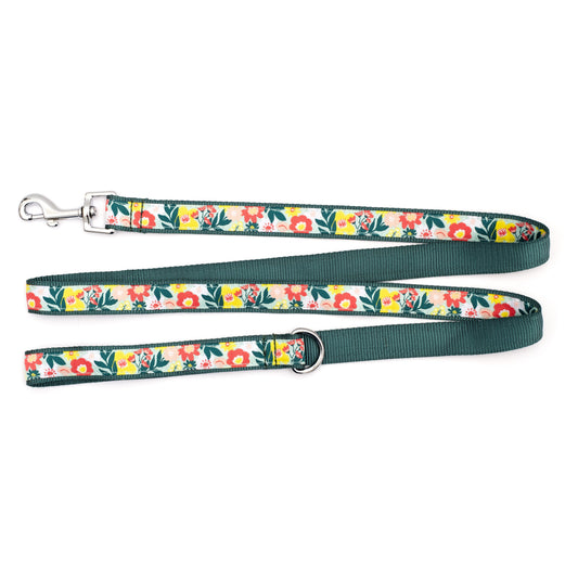 Colorful flowers and green foliage on pale ribbon nylon dog leash, ribbon and dark green backing detail