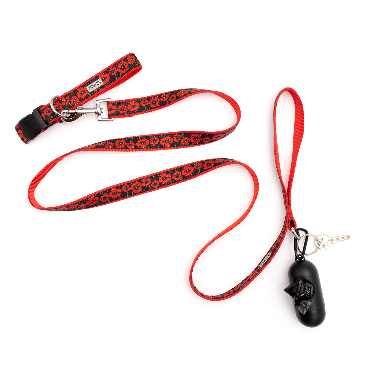 Black Poppy Floral Nylon Dog Leash — leash shown with collar and dispenser