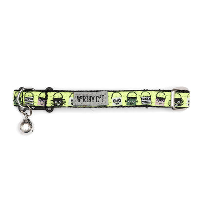 Halloween candy-bucket characters on lime ribbon Halloween cat collar, buckle and bell detail