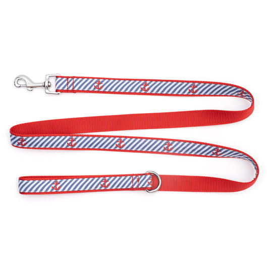 Red anchors over diagonal navy and white stripes nylon dog leash, ribbon and red backing detail
