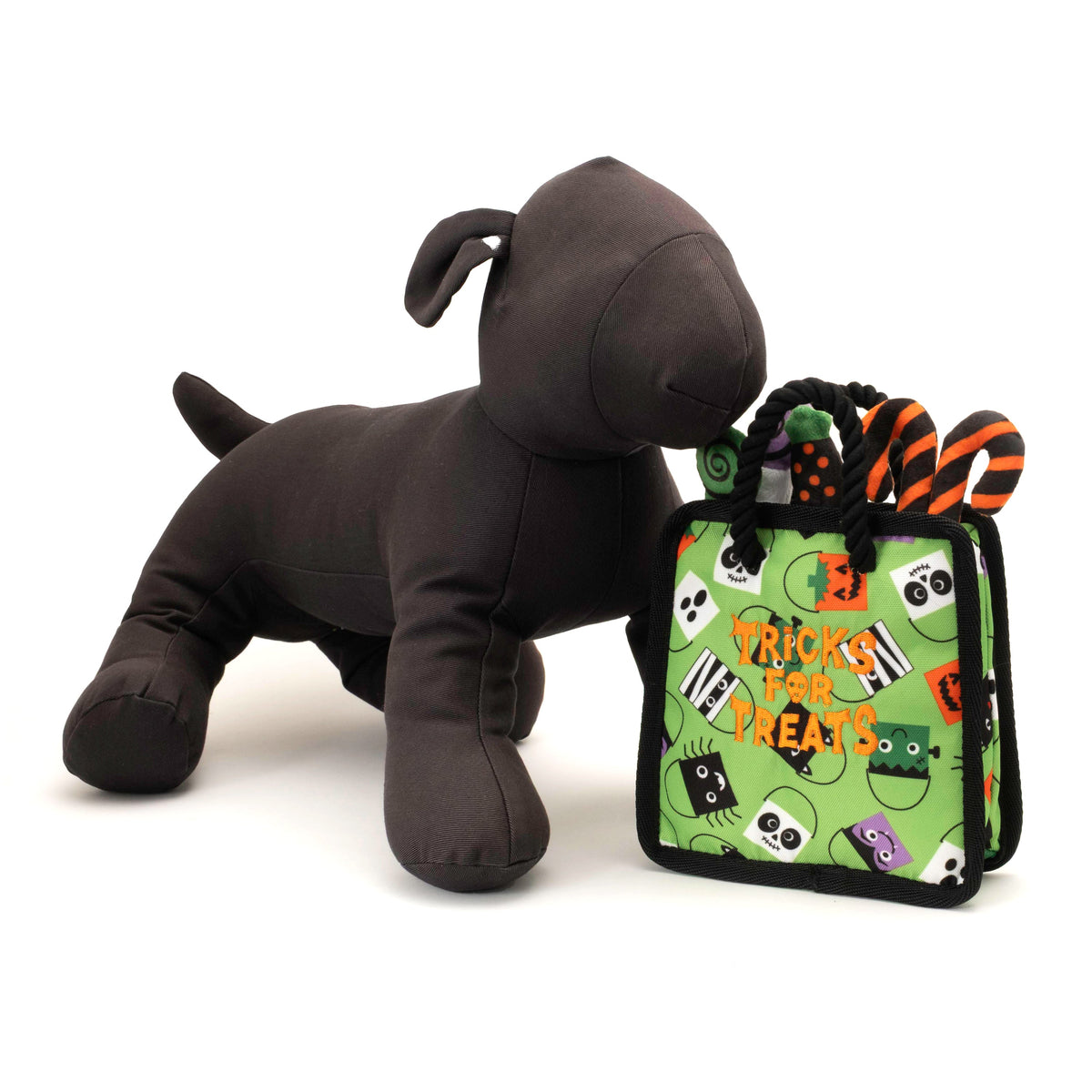 Halloween Treat Bag Squeaky Dog Toy, scale beside a display dog