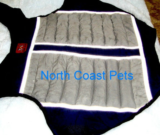 a dog coat on a blanket