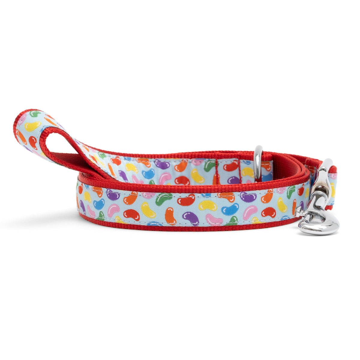 Jelly Beans dog leash with colorful candy shapes on pale-blue ribbon and red nylon backing, coiled